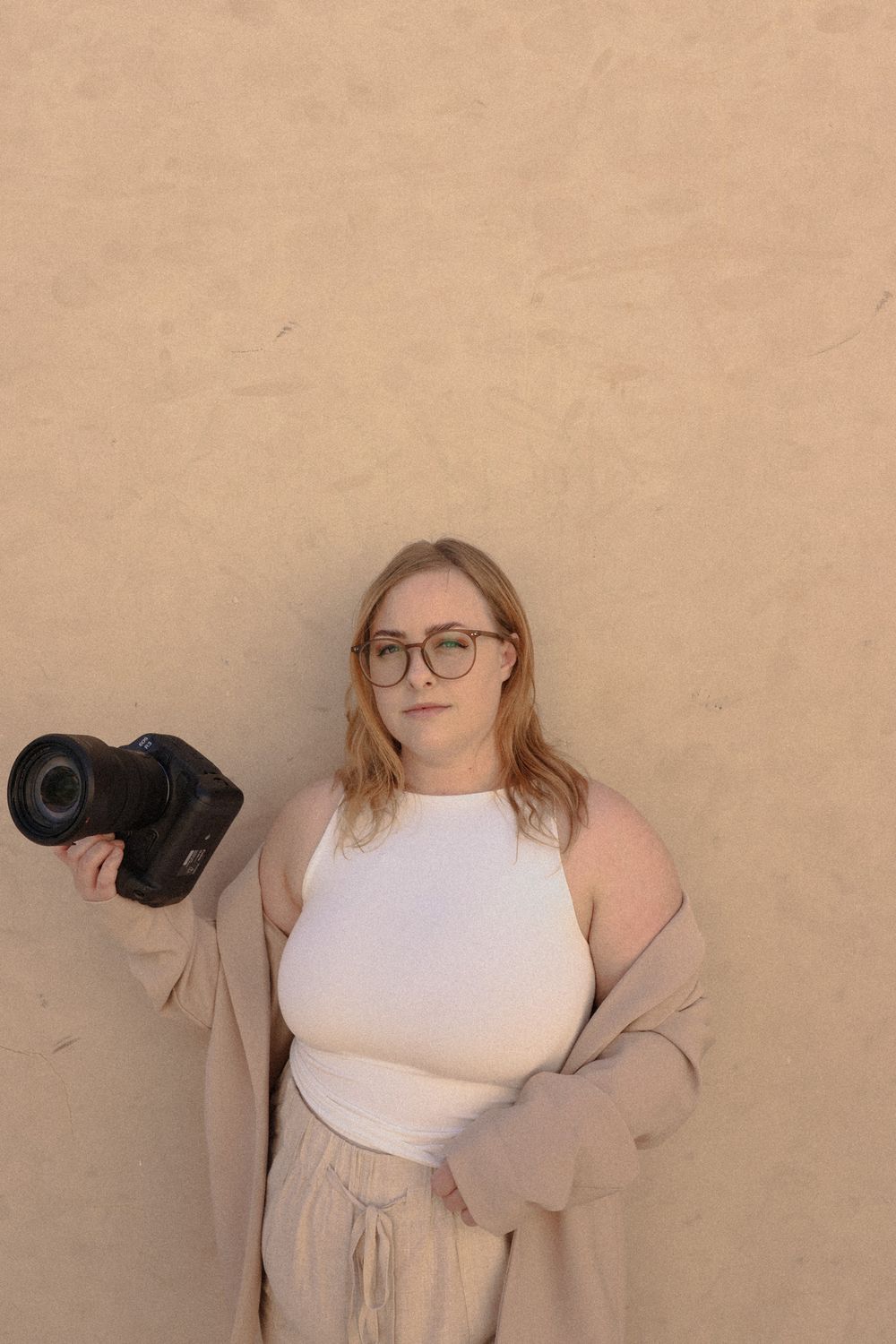 Juhlya holding her camera